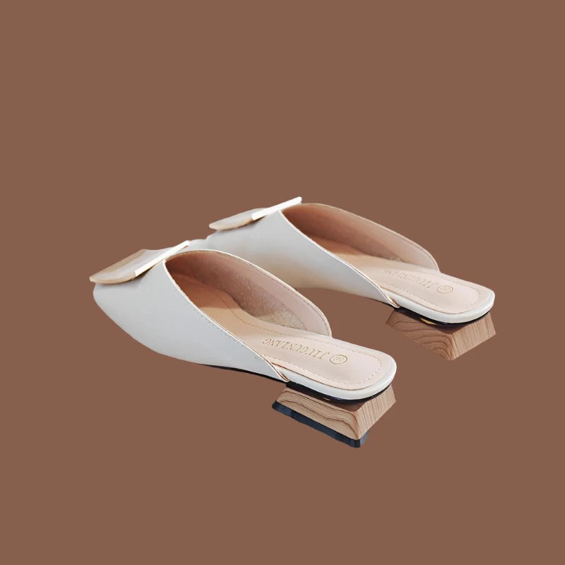 A Causal Low Heel Slipper it's Summer Elegance