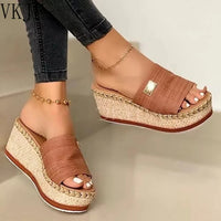 Step Up in Style in this Summer's Platform Wedge Slippers